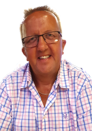 profile image of Lion President Ian Snell with a big smiley face.